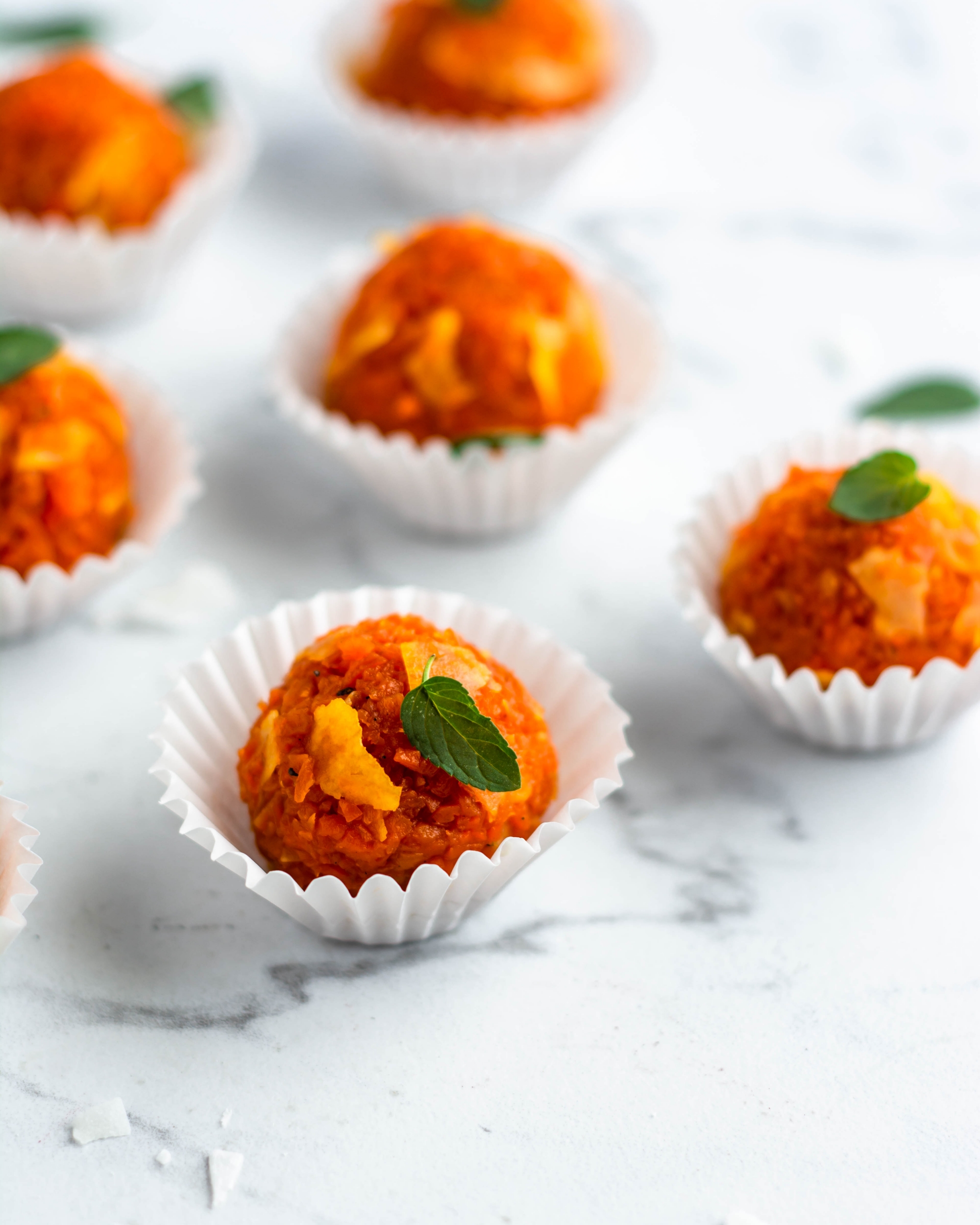 Carrot truffles in white cups