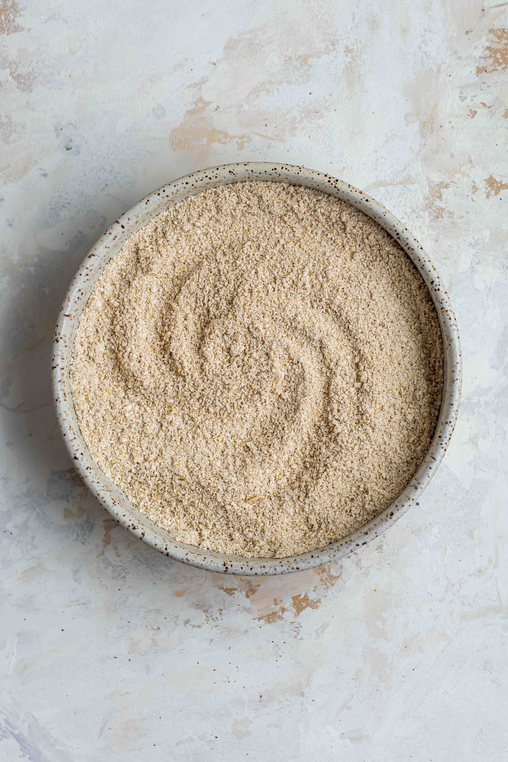 oat flour in a ceramic bowl